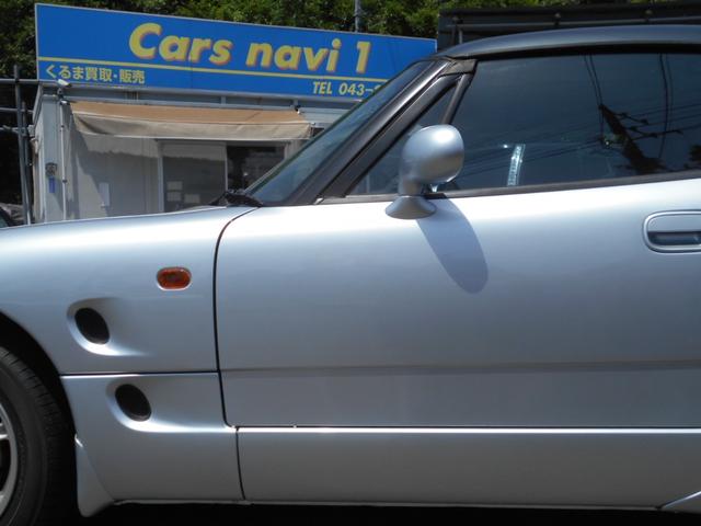 カプチーノ ベースグレード　最終型　５速マニュアル　ツインカムターボ　ノーマル車　４ＷＡＹオープンカー　純正リアウイング　後期型専用１４インチアルミ　ＣＤオーディオ　ＥＴＣ付　収納ネット　ルーフ収納カバー付き（30枚目）