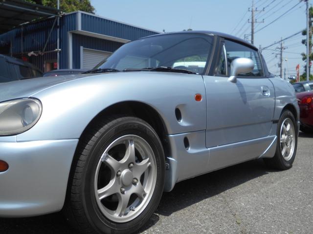 カプチーノ ベースグレード　最終型　５速マニュアル　ツインカムターボ　ノーマル車　４ＷＡＹオープンカー　純正リアウイング　後期型専用１４インチアルミ　ＣＤオーディオ　ＥＴＣ付　収納ネット　ルーフ収納カバー付き（36枚目）