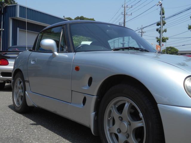 カプチーノ ベースグレード　最終型　５速マニュアル　ツインカムターボ　ノーマル車　４ＷＡＹオープンカー　純正リアウイング　後期型専用１４インチアルミ　ＣＤオーディオ　ＥＴＣ付　収納ネット　ルーフ収納カバー付き（37枚目）