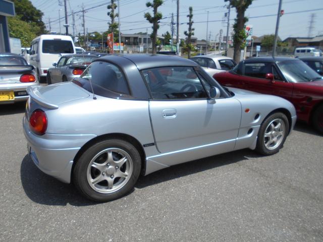 カプチーノ ベースグレード　最終型　５速マニュアル　ツインカムターボ　ノーマル車　４ＷＡＹオープンカー　純正リアウイング　後期型専用１４インチアルミ　ＣＤオーディオ　ＥＴＣ付　収納ネット　ルーフ収納カバー付き（45枚目）