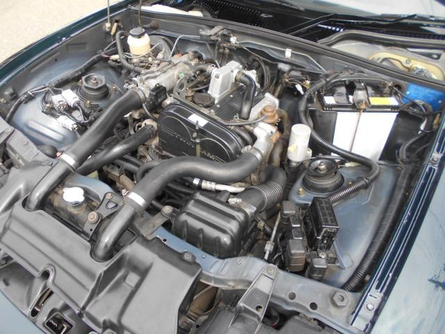 カプチーノ ベースグレード　ツインカムターボ　５速マニュアル　ノーマル車　純正１４インチアルミ　スズキスポーツマフラー　４ＷＡＹオープンカー　ＣＤオーディオ　木目調パネル　ダーククラシックジェイドパール（22枚目）