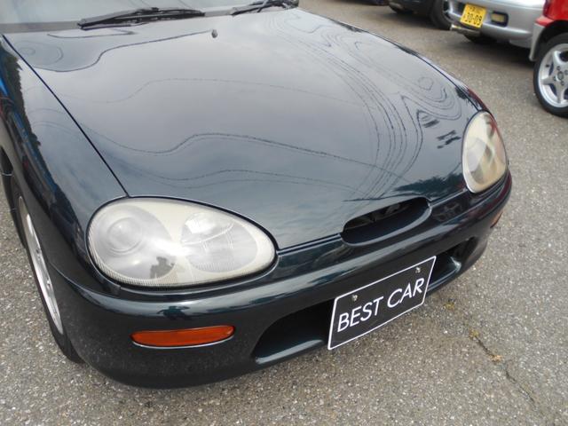 カプチーノ ベースグレード　ツインカムターボ　５速マニュアル　ノーマル車　純正１４インチアルミ　スズキスポーツマフラー　４ＷＡＹオープンカー　ＣＤオーディオ　木目調パネル　ダーククラシックジェイドパール（37枚目）