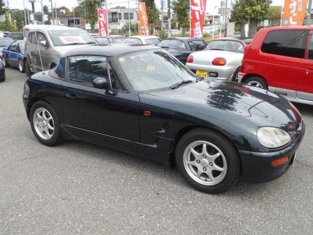 カプチーノ ベースグレード　ツインカムターボ　５速マニュアル　ノーマル車　純正１４インチアルミ　スズキスポーツマフラー　４ＷＡＹオープンカー　ＣＤオーディオ　木目調パネル　ダーククラシックジェイドパール（40枚目）