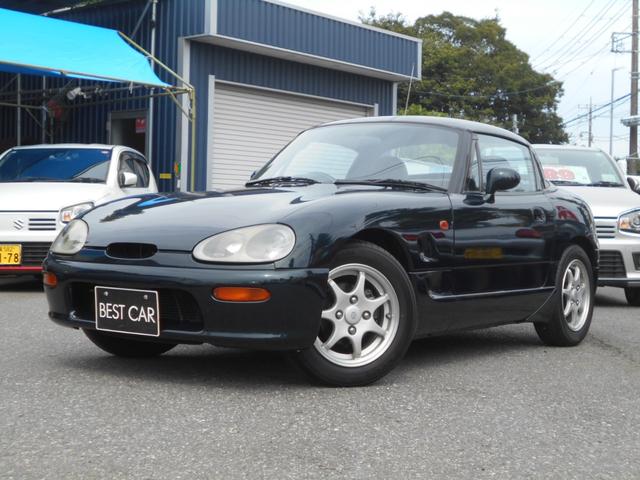 カプチーノ ベースグレード　ツインカムターボ　５速マニュアル　ノーマル車　純正１４インチアルミ　スズキスポーツマフラー　４ＷＡＹオープンカー　ＣＤオーディオ　木目調パネル　ダーククラシックジェイドパール（46枚目）