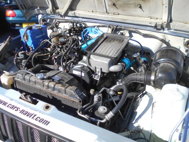 ジムニー ランドベンチャー　５速　４ＷＤ　ターボ　リフトアップ　１６インチアルミ　マッドタイヤ　社外前後バンパー　ウイルズウインマフラー　ＬＥＤヘッドライト　背面タイヤ　パワステ　ＣＤ　ＥＴＣ　タイミングベルト一式交換済（24枚目）