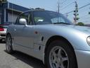 ベースグレード　最終型　５速マニュアル　ツインカムターボ　ノーマル車　４ＷＡＹオープンカー　純正リアウイング　後期型専用１４インチアルミ　ＣＤオーディオ　ＥＴＣ付　収納ネット　ルーフ収納カバー付き（37枚目）