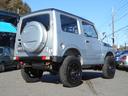 ジムニー ランドベンチャー　５速　４ＷＤ　ターボ　リフトアップ　１６インチアルミ　マッドタイヤ　社外前後バンパー　ウイルズウインマフラー　ＬＥＤヘッドライト　背面タイヤ　パワステ　ＣＤ　ＥＴＣ　タイミングベルト一式交換済（4枚目）