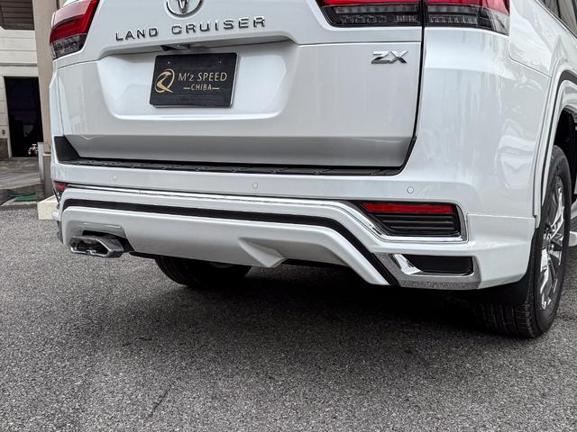 ランドクルーザー ＺＸ　登録済み未使用車　ＴコネクトＳＤナビ　ＪＢＬスピーカー　リヤエンターシステム　寒冷地仕様　ＰＶＭ　ＢＳＭ　ＥＴＣ２．０　リヤデフロック　ルーフレール　空気圧警報システム　クールボックス　ルーフレール（34枚目）