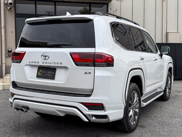 ランドクルーザー ＺＸ　登録済み未使用車　ＴコネクトＳＤナビ　ＪＢＬスピーカー　リヤエンターシステム　寒冷地仕様　ＰＶＭ　ＢＳＭ　ＥＴＣ２．０　リヤデフロック　ルーフレール　空気圧警報システム　クールボックス　ルーフレール（44枚目）