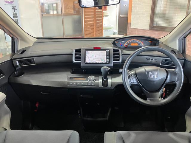 フリード Ｇ　Ｌパッケージ　１年保証走行距離無制限　純正ＨＤＤナビ　ＴＶ　バックカメラ　左オートスライドドア　ＨＩＤ　ＥＴＣ　ドライブレコーダー　キーレス　車検整備付　修復歴無（3枚目）