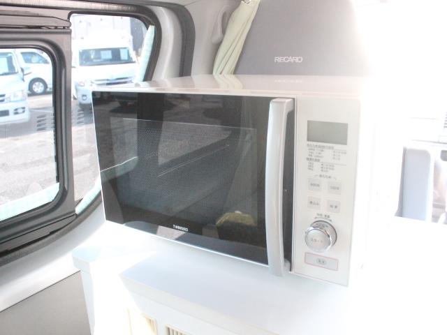 ハイエースバン キャンパー鹿児島 バース (リチウムバッテリー)(1500Wインバーター)(ベバスト製FFヒーター)(家庭用エアコン)(DC冷蔵庫)(電子レンジ)(コンバーター)(走行充電)(シンク)(11枚目)