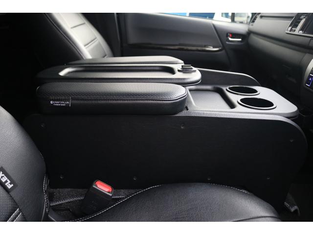 ハイエースバン スーパーＧＬ　ダークプライムＩＩ　ＭＢカスタム　ＢＩＧＸ　フローリング　ベッドキット　ルーフスピーカー　シートカバー　ダウンライト　サイドバー　アミエース　フローリング　ファルケン　Ｗ１１　１７インチ　ＥＴＣ　センターコンソール（30枚目）