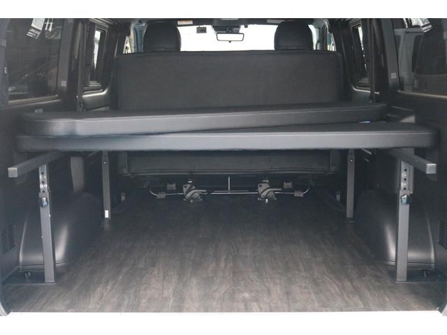 ハイエースバン スーパーＧＬ　ダークプライムＩＩ　ＭＢカスタム　ＢＩＧＸ　フローリング　ベッドキット　ルーフスピーカー　シートカバー　ダウンライト　サイドバー　アミエース　フローリング　ファルケン　Ｗ１１　１７インチ　ＥＴＣ　センターコンソール（34枚目）