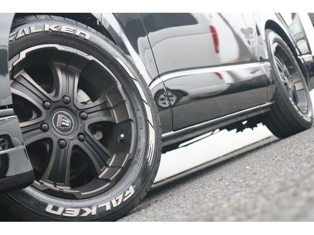 ハイエースバン スーパーＧＬ　ダークプライムＩＩ　ＭＢカスタム　ＢＩＧＸ　フローリング　ベッドキット　ルーフスピーカー　シートカバー　ダウンライト　サイドバー　アミエース　フローリング　ファルケン　Ｗ１１　１７インチ　ＥＴＣ　センターコンソール（35枚目）