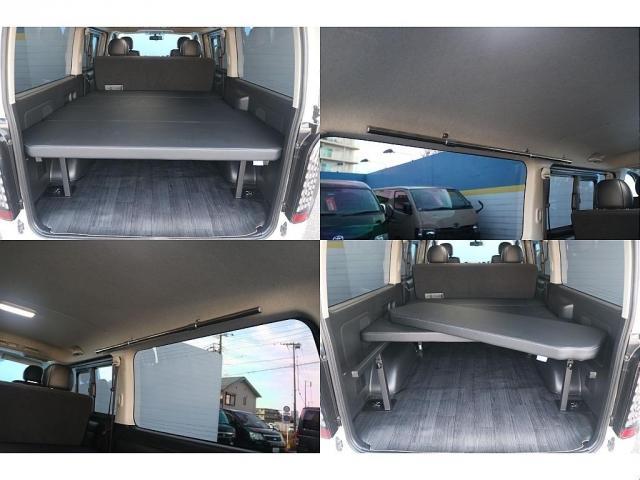 ハイエースバン スーパーＧＬ　ダークプライム　ベッドキット　ＣＦカーゴ　社外フロントスポイラー　煌ＬＥＤテール　７インチナビ　サイドバー　ＥＴＣ　バックカメラ　ベッドキット　ガッツミラー同色塗装　フェニーチェ　１６インチ　グッドイヤー（3枚目）