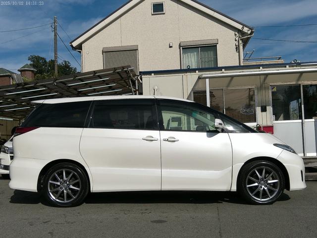 エスティマ アエラス　レザーパッケージ　保証付　本革シート　シートヒーター　クルーズコントロール　両側パワースライドドア　オットマン付きキャプテンシート　純正ＨＤＤナビ　バックカメラ　ＥＴＣ　Ｄ席パワーシート　フルセグ地デジ　インテリキー（6枚目）