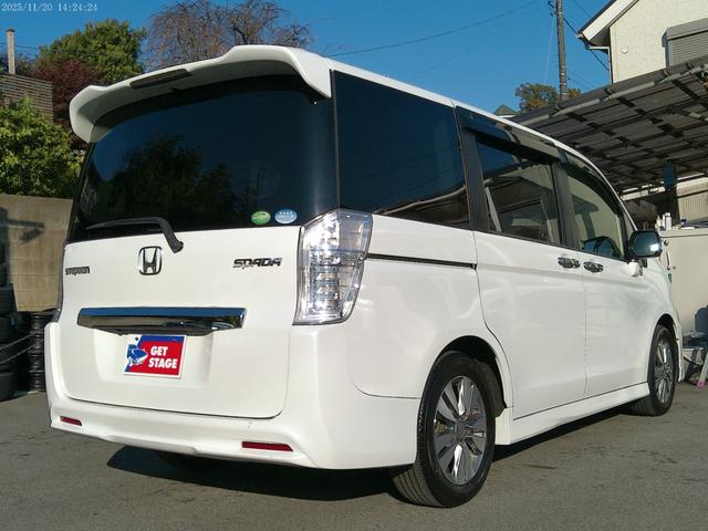 ステップワゴンスパーダ Ｚ　インターナビセレクション　保証付　後期型　フリップダウンモニター　両側パワースライドドア　純正ＨＤＤナビ　バックカメラ　クルーズコントロール　ＥＴＣ　キャプテンシート７人　アイドリングストップ　パドルシフト　インテリキー（2枚目）