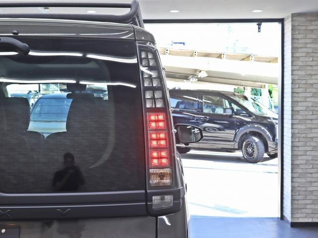 ヴォクシー ハイブリッドＸ　ＴＯＹＯＴＡグリル／Ｇｚフードモール／ＮＥＷ１５インチスチールホイール／マッドスタータイヤ／ルーフラック／純正ＳＤナビ＆地デジＴＶ／Ｂｌｕｅｔｏｏｔｈ接続／両側電動スライドドア／ブラウンシートカバー（19枚目）
