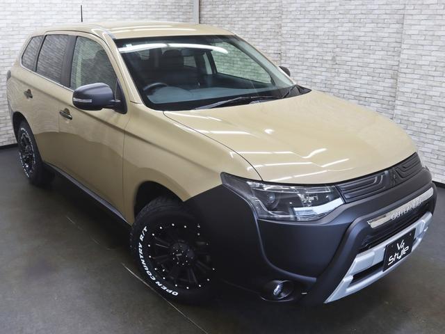 アウトランダー ２４Ｇナビパッケージ　ＮＥＷ１６ｉｎＡＷ／ＴＯＹＯオープンカントリーＲＴタイヤ／マットグリル／テールランプブラックアウト／４ＷＤ／プッシュスタート／７人乗り／スマートキー／クルーズコントロール／全塗装済（2枚目）