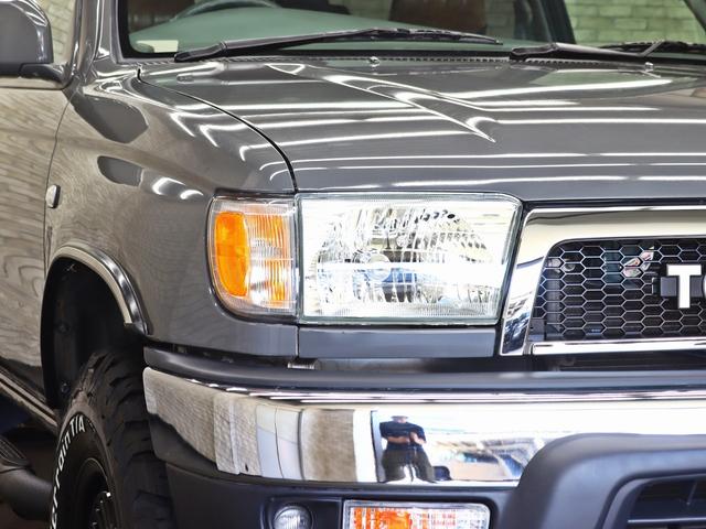 ハイラックスサーフ SSR-X オリジナルナローパッケージ/US4RUNNER仕様/TOYOTAクラシックグリル/NEW16インチ新品クリムソンアルミ/BFグッドリッチタイヤ/社外サイドステップ/背面タイヤ/キャメルシートカバー(9枚目)