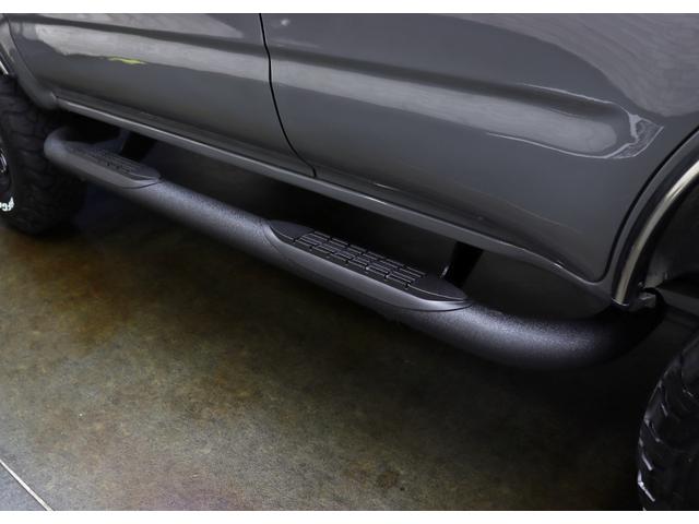 ハイラックスサーフ SSR-X オリジナルナローパッケージ/US4RUNNER仕様/TOYOTAクラシックグリル/NEW16インチ新品クリムソンアルミ/BFグッドリッチタイヤ/社外サイドステップ/背面タイヤ/キャメルシートカバー(14枚目)