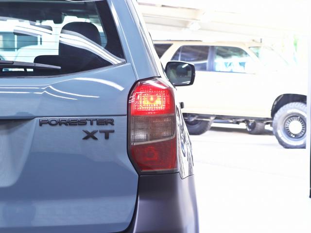 フォレスター 2.0XT アイサイト 4WD/サンルーフ/アイサイト/16インチアルミホイール/TOYOオープンカントリーRTタイヤ/ルーフラック/テールランプブラックアウト/Rスポイラー/シートヒーター/Bt接続/バックカメラ/記録簿付(20枚目)
