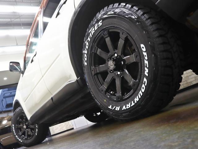 エクストレイル ２５Ｘ　４ＷＤ／ＮＩＳＳＡＮクラシックグリル／リフトＵＰ／新品１６インチＡＷ／ＴＯＹＯオープンカントリーＲＴ新品タイヤ／インナーブラックヘッドライト／カブロシート／社外ルーフキャリア／ＤＡＣ機能／キーレスキー（14枚目）