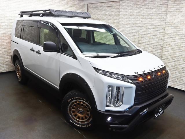 デリカＤ：５ Ｐ　４ＷＤ／両側電動ＳＤ／ドラレコ／ｅ‐Ａｓｓｉｓｔ／１０インチナビ／ＩＰＦグリルマーカー／ＢＵＳＴＥＲＳ２０８０／ＧＯＱＢＵＴＯ／ＪＡＯＳオーバーフェンダー／ＮＥＷ１６インチＡＷ／ＢＦＧタイヤ／記録簿付（2枚目）