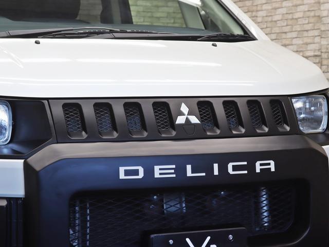 デリカＤ：５ Ｇ　パワーパッケージ　両側電動ＳＤ／クラシック角目換装ＫＩＴ／ＢＵＳＴＥＲＳ２０８０ＨＤ改／革調シートカバー／アルパイン後席モニター／ＪＡＯＳオーバーフェンダー／リフトＵＰ／ＮＥＷ１６インチＡＷ＆ＢＦＧタイヤ／記録簿付（10枚目）