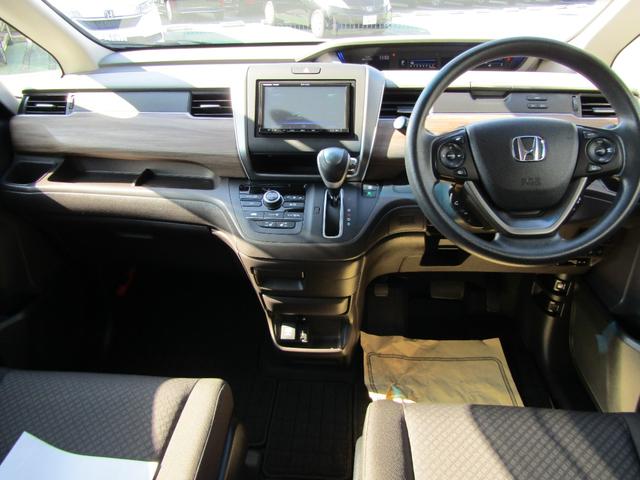 フリード Ｇ・ホンダセンシング　ワンオーナー　禁煙車　当社点検パック実施済車　パナソニックナビ　フルセグ　Ｂｌｕｅｔｏｏｔｈ　ドラレコ　シートヒーター　両側電動スライドドア　ＬＥＤヘッドライト　オートライト　ＥＴＣ　バックカメラ（12枚目）