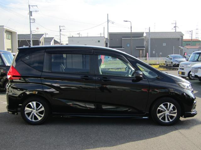 フリード Ｇ・ホンダセンシング　ワンオーナー　禁煙車　当社点検パック実施済車　純正９インチナビ　フルセグ　Ｂｌｕｅｔｏｏｔｈ　ミュージックサーバー　前後ドラレコ　ＵＳＢ　両側電動スライドドア　ＬＥＤヘッドライト　１５インチアルミ（11枚目）