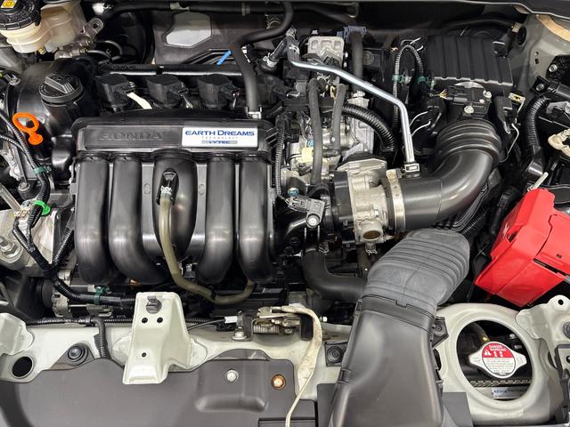 フィット １３Ｇ・Ｌホンダセンシング　ワンオーナー　禁煙車　当社点検パック実施済車　純正ナビ　ＣＤ　Ｂｌｕｅｔｏｏｔｈ　ＵＳＢ　ＬＥＤヘッドライト　オートライト　バックカメラ　ＥＴＣ　スマートキー　アイドリングストップ　サイドエアバック（2枚目）