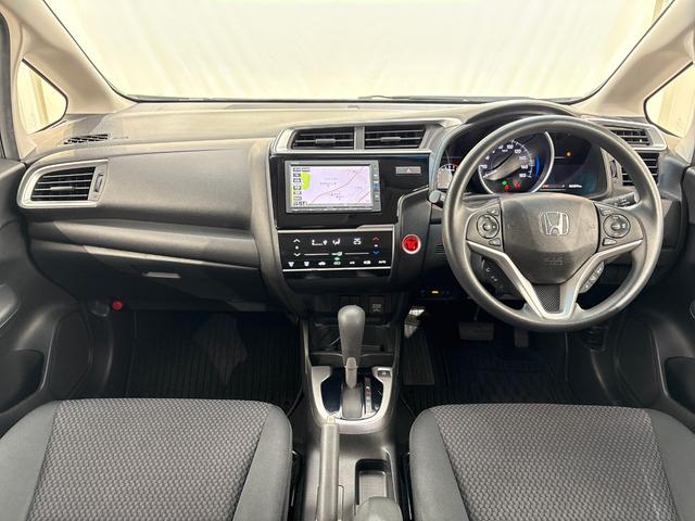 フィット １３Ｇ・Ｌホンダセンシング　ワンオーナー　禁煙車　当社点検パック実施済車　純正ナビ　ＣＤ　Ｂｌｕｅｔｏｏｔｈ　ＵＳＢ　ＬＥＤヘッドライト　オートライト　バックカメラ　ＥＴＣ　スマートキー　アイドリングストップ　サイドエアバック（9枚目）