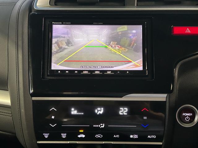 フィットハイブリッド Ｆパッケージ　ドラレコ　ナビ・ＴＶ　Ｂｌｕｅｔｏｏｔｈ接続可能　バックカメラ　ＥＴＣ　社外アルミホイール　ハイブリットカー　ドアバイザー（11枚目）