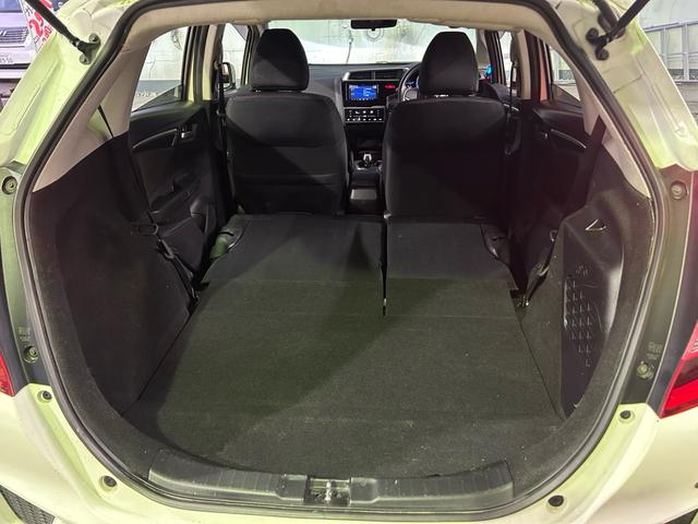 フィットハイブリッド Ｆパッケージ　ドラレコ　ナビ・ＴＶ　Ｂｌｕｅｔｏｏｔｈ接続可能　バックカメラ　ＥＴＣ　社外アルミホイール　ハイブリットカー　ドアバイザー（27枚目）