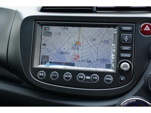 フィットハイブリッド ＲＳファインスタイル　ワンオーナー　禁煙車　ＨＤＤナビ　リアカメラ　ＥＴＣ　クルーズコントロール　記録簿　オートクルーズ　キーレス　スマ－トキ－　パワーステアリング　ワンセグ　バックカメラ　盗難防止システム　ＡＡＣ　ＡＢＳ（16枚目）