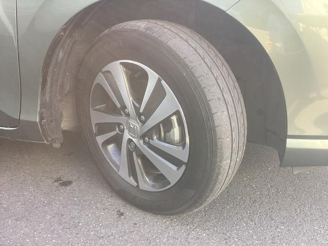 フリードハイブリッド ハイブリッド・Ｇ　純正９インチメモリーナビ　ＥＴＣ　バックカメラ　シートヒータ　両側電動スライドドア　両電動ドア　サイドエアバック　クルコン　スマキー　パワーステアリング　ＬＥＤライト　フルセグＴＶ　ウォークスルー（26枚目）