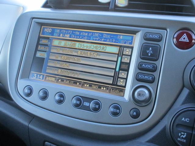 フィットハイブリッド スマートセレクション　ナビ・メモリーナビ・ＨＤＤインターナビ・ディスチャージヘッドライト・スマートキーシステム・運転席助手席エアバック・頚部衝撃緩和フロントシート運転席シートベルト締め忘れ警告ブザー＆警告灯　地デジＴＶ（11枚目）