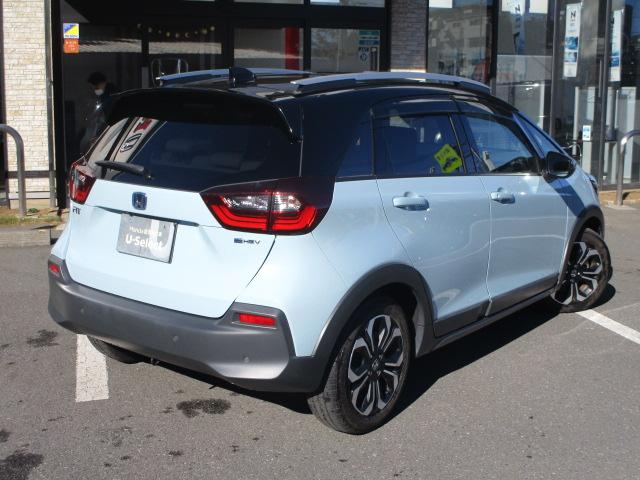 フィット ｅ：ＨＥＶクロスター　ＨｏｎｄａＳＥＮＳＩＮＧ・純正９インチナビ・純正ドライブレコーダー前後・ＥＴＣ２．０車載器・フルＬＥＤヘッドライト・純正アルミホイール・リアカメラ・ワンオーナー　ｂｌｕｅｔｏｏｔｈ　ルーフレール（2枚目）