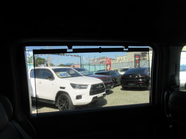 ステップワゴン e:HEVスパーダ プレミアムライン ・純正ギャザーズ9型ナビ 純正10型フリップダウンモニター フルセグTV 黒半革 シートヒーター CMBS 両側自動ドア 電動テールゲート 踏み間違い衝突軽減 BSM 無限フロアマット&サイドバイザー(22枚目)