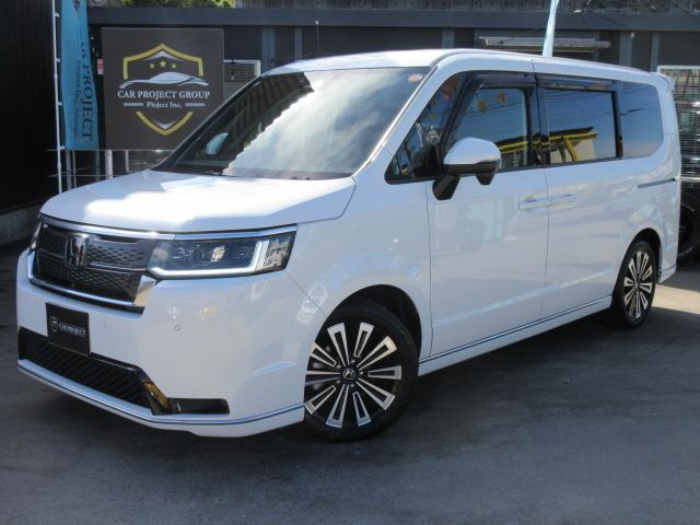 ステップワゴン e:HEVスパーダ プレミアムライン ・純正ギャザーズ9型ナビ 純正10型フリップダウンモニター フルセグTV 黒半革 シートヒーター CMBS 両側自動ドア 電動テールゲート 踏み間違い衝突軽減 BSM 無限フロアマット&サイドバイザー(28枚目)