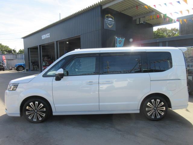 ステップワゴン e:HEVスパーダ プレミアムライン ・純正ギャザーズ9型ナビ 純正10型フリップダウンモニター フルセグTV 黒半革 シートヒーター CMBS 両側自動ドア 電動テールゲート 踏み間違い衝突軽減 BSM 無限フロアマット&サイドバイザー(30枚目)