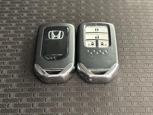 ステップワゴンスパーダ スパーダホンダセンシング　純正メモリーナビ　フルセグＴＶ　バックカメラ　ＥＴＣ２．０　両側パワースライドドア　前後ドラレコ　２列目ベンチシート　盗難防止　助手席エアバッグ　Ｗパワスラ　リアオートエアコン　地デジ　ＬＥＤライト（44枚目）