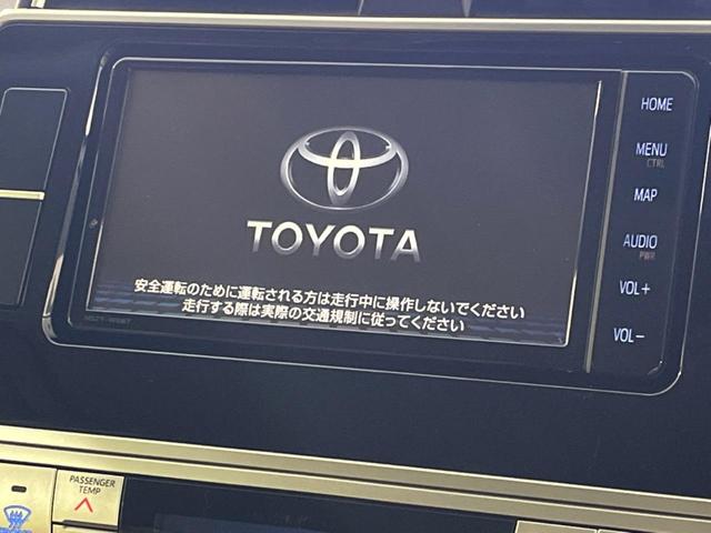 ＴＸ　Ｌパッケージ　７０ｔｈアニバーサリーリミテッド　禁煙車　純正ＳＤナビ　トヨタセーフティセンス　レーダークルーズ　ブラックルーフレール　　オートマチックハイビーム　ウッドコンビステアリング　サドルタン革シート　前席快適温熱シート　ビルトインＥＴＣ(3枚目)