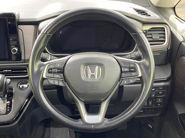 オデッセイハイブリッド ｅ：ＨＥＶアブソルート・ＥＸ　禁煙車　純正１０型ナビ　後席モニター　全周囲カメラ　両側電動スライドドア　ホンダセンシング　アダプティブクルーズ　ＥＴＣ２．０　ドラレコ　シートヒーター　電動リアゲート　ＬＥＤヘッド　１００Ｖ電源（12枚目）