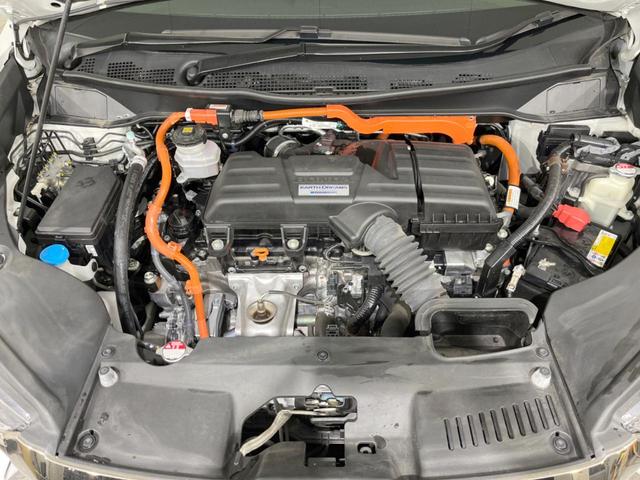 オデッセイハイブリッド ｅ：ＨＥＶアブソルート・ＥＸ　禁煙車　純正１０型ナビ　後席モニター　全周囲カメラ　両側電動スライドドア　ホンダセンシング　アダプティブクルーズ　ＥＴＣ２．０　ドラレコ　シートヒーター　電動リアゲート　ＬＥＤヘッド　１００Ｖ電源（18枚目）