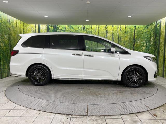オデッセイハイブリッド ｅ：ＨＥＶアブソルート・ＥＸ　禁煙車　純正１０型ナビ　後席モニター　全周囲カメラ　両側電動スライドドア　ホンダセンシング　アダプティブクルーズ　ＥＴＣ２．０　ドラレコ　シートヒーター　電動リアゲート　ＬＥＤヘッド　１００Ｖ電源（64枚目）