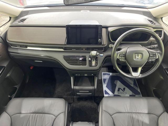オデッセイハイブリッド ｅ：ＨＥＶアブソルート・ＥＸ　禁煙車　純正１０型ナビ　全周囲カメラ　黒革シート　両側電動スライドドア　ホンダセンシング　アダプティブクルーズ　ＥＴＣ２．０　ドラレコ　シートヒーター　電動リアゲート　ＬＥＤヘッドライト　１００Ｖ電源（2枚目）