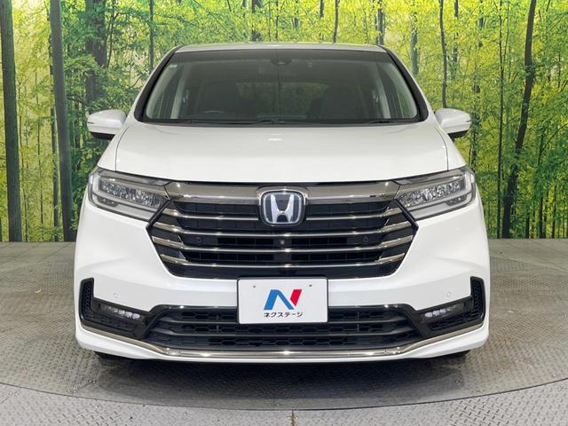 オデッセイハイブリッド ｅ：ＨＥＶアブソルート・ＥＸ　禁煙車　純正１０型ナビ　全周囲カメラ　黒革シート　両側電動スライドドア　ホンダセンシング　アダプティブクルーズ　ＥＴＣ２．０　ドラレコ　シートヒーター　電動リアゲート　ＬＥＤヘッドライト　１００Ｖ電源（15枚目）