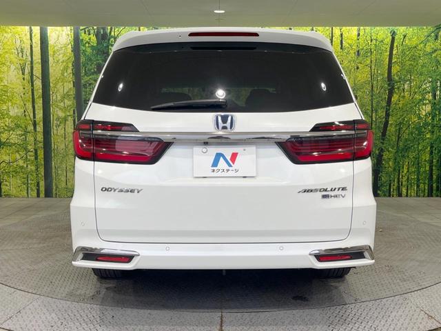 オデッセイハイブリッド ｅ：ＨＥＶアブソルート・ＥＸ　禁煙車　純正１０型ナビ　全周囲カメラ　黒革シート　両側電動スライドドア　ホンダセンシング　アダプティブクルーズ　ＥＴＣ２．０　ドラレコ　シートヒーター　電動リアゲート　ＬＥＤヘッドライト　１００Ｖ電源（16枚目）